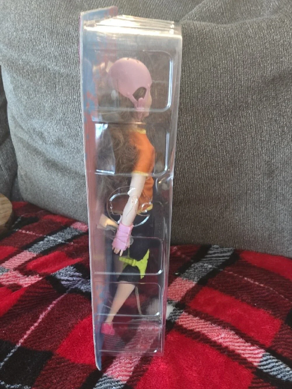 Barbie Skateboarding Doll in Orange Top with Pink Helmet and Neon Yellow Pads